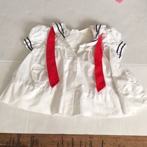 White sailor outfit with red ribbon for girl